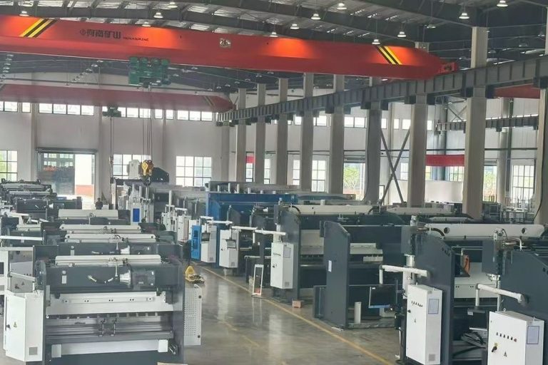 Rows of BEIGEMA press brakes on the factory floor