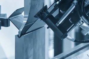 Press brake tooling and a gripper holding a bent sheet-metal part