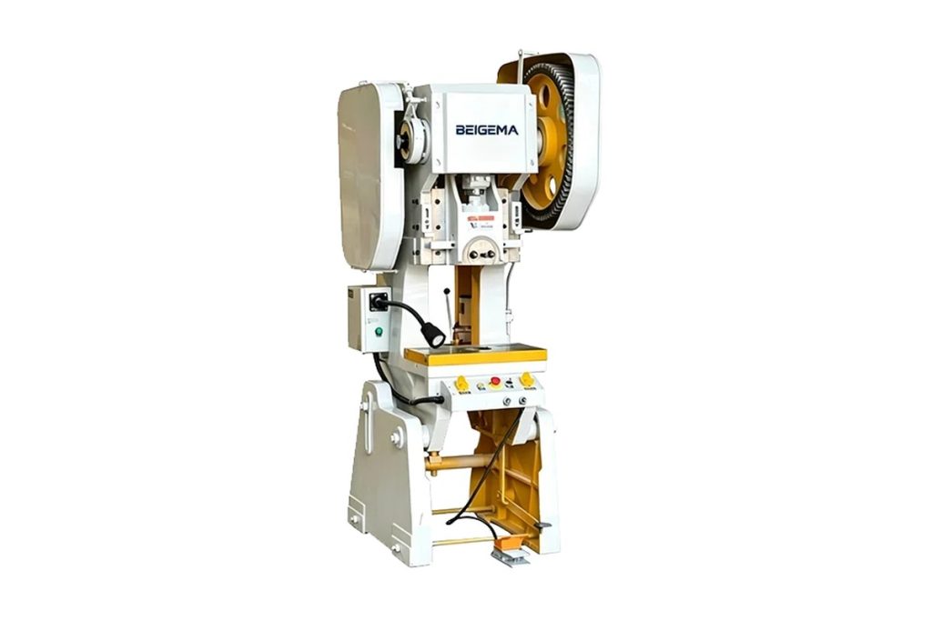 BEIGEMA JB23 mechanical power press with a side flywheel guard, yellow worktable and foot pedal
