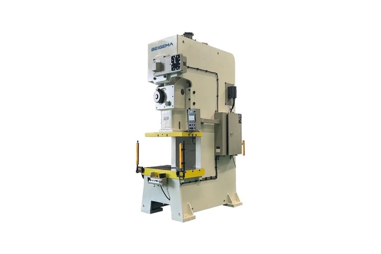 BEIGEMA C-frame pneumatic press with a control panel, yellow bolster and safety light curtains on both sides